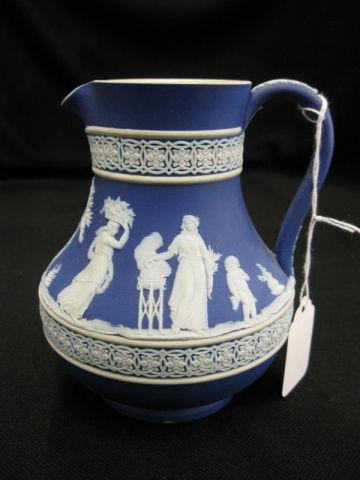 Appraisal: Wedgwood Dark Blue Jasperware Pitcher squat form classical scenes excellent