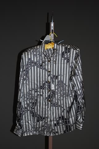 Appraisal: Escada wide black vertical stripes on cr me background with