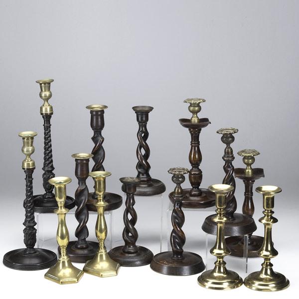 Appraisal: Seven pairs of candlesticks th th C Brass and brass