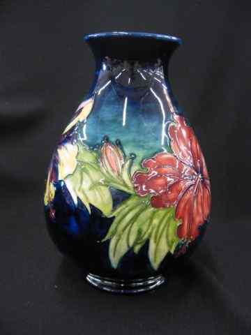 Appraisal: Moorcroft Art Pottery Vase Hibiscus designs on rich blue signed