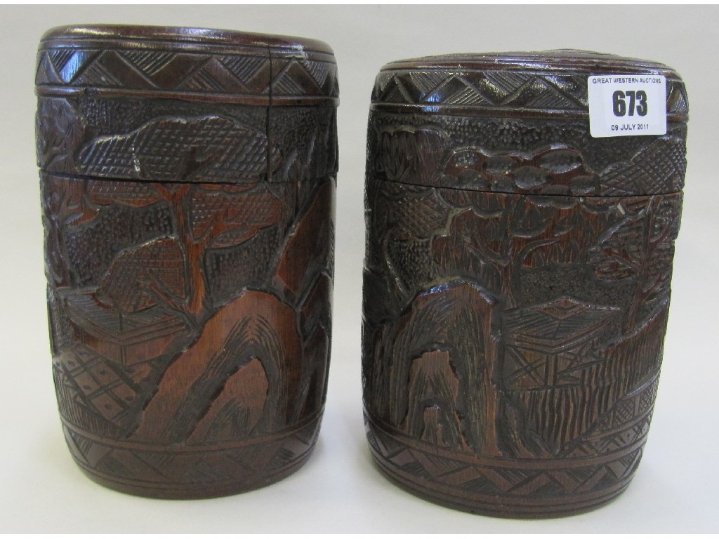 Appraisal: Pair of carved bamboo pots and covers