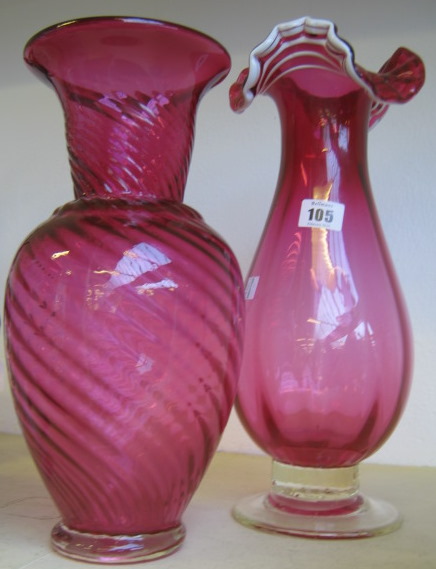 Appraisal: A cranberry glass vase with spiral twist body cm and