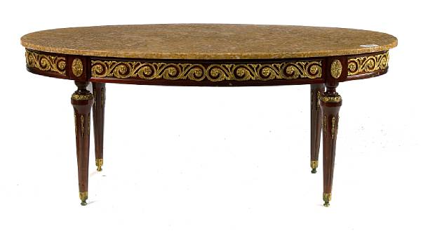 Appraisal: A Louis XVI style marble topped coffee table height in