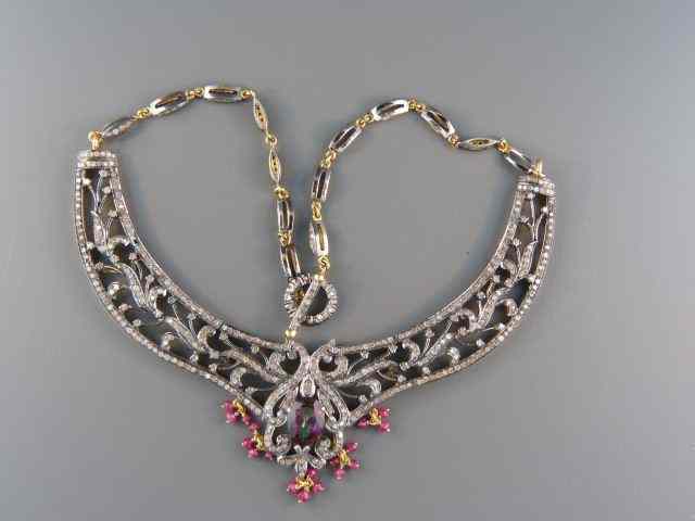 Appraisal: Diamond Ruby Mystic Topaz Necklace Mogul style gold silver setting