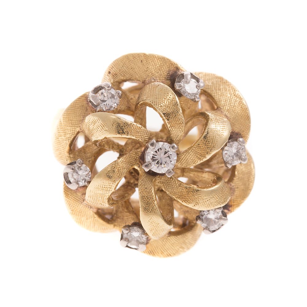 Appraisal: A Ladies Diamond Pinwheel Ring in K K yellow gold