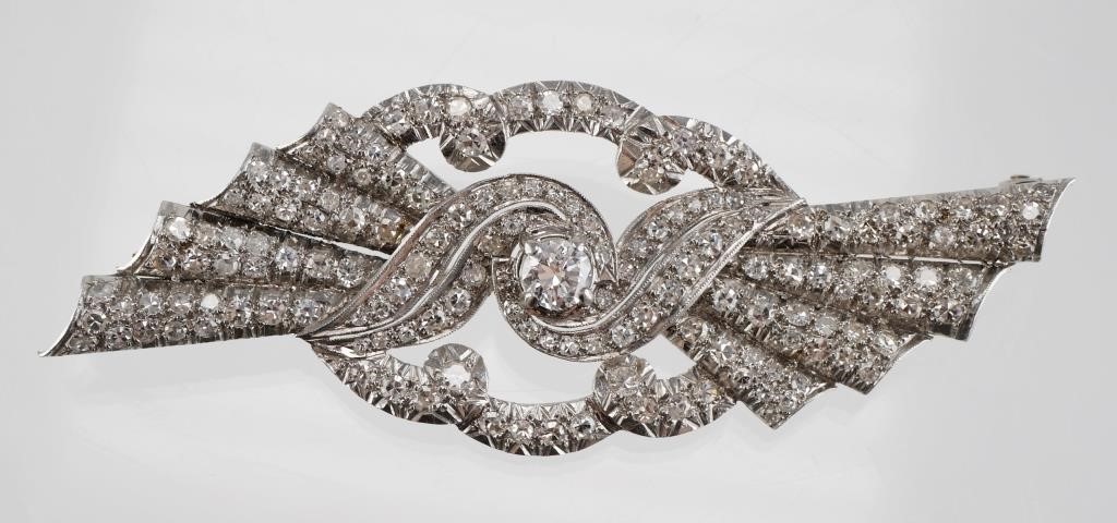 Appraisal: Platinum diamond brooch containing one old European cut diamond measuring