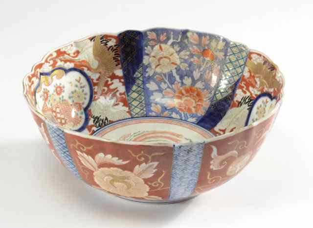 Appraisal: JAPANESE IMARI PORCELAIN CENTER BOWL hand painted with reserves of