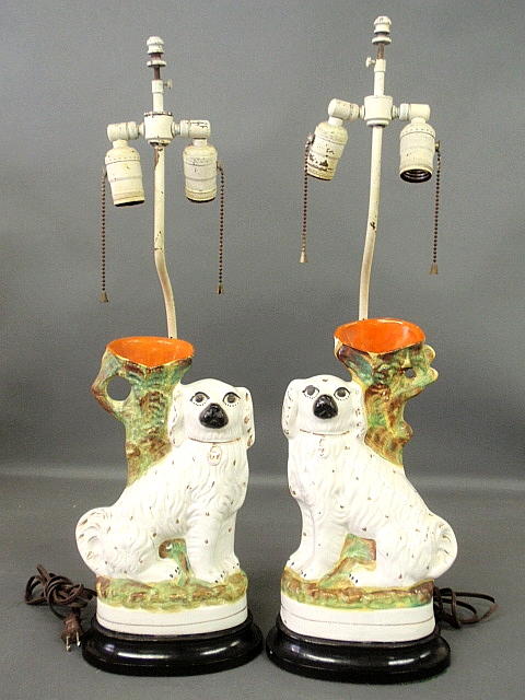 Appraisal: - Pair of Staffordshire spill vases of spaniels c converted