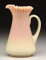 Appraisal: MT WASHINGTON BURMESE CREAMER Petticoat shaped creamer with heavily ruffled