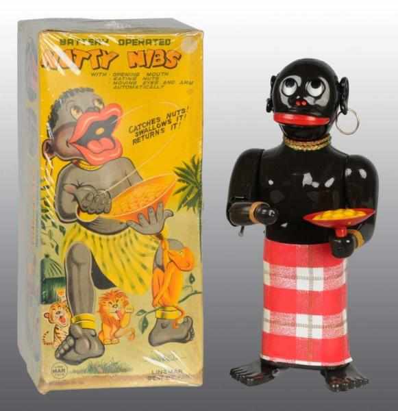 Appraisal: Tin Nutty Nibs Native Battery-Operated Toy Description Japanese Working Made