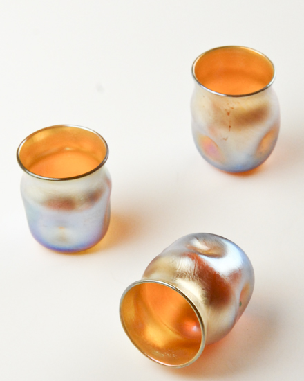 Appraisal: Three Tiffany Favrile Cordials in iridescent gold each marked L