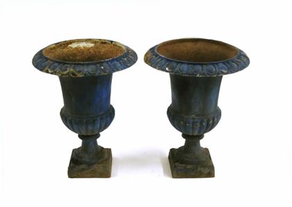 Appraisal: Pair of blue painted cast-iron urnsHaving a plain body with