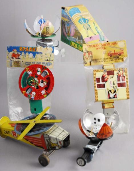 Appraisal: Lot of Character Sparkler Toys Description Circa s to s