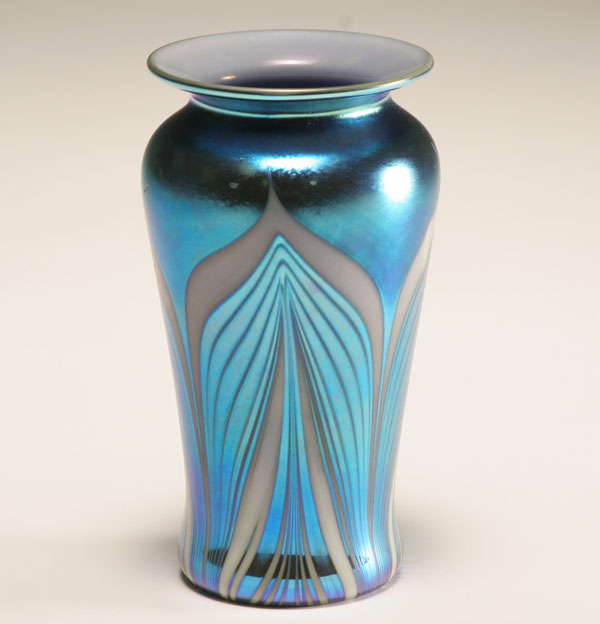 Appraisal: Steve Carlson blue iridescent glass baluster form vase Vertical white