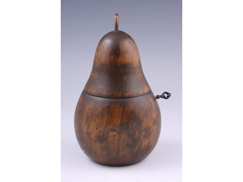 Appraisal: Antique Treenware Pear-Shaped Tea Caddy feathered exterior surfaces hinged lid