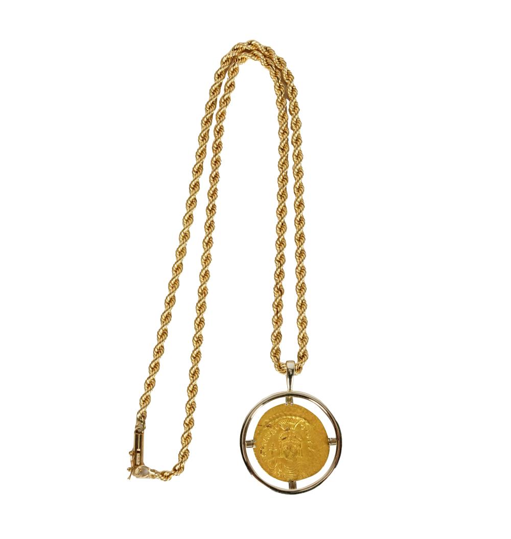 Appraisal: KARAT YELLOW GOLD COIN NECKLACEthe pendant centering one high karat