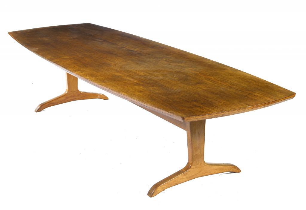 Appraisal: A LUPTON MORTON TEAK TABLE on trestles with stretcher and