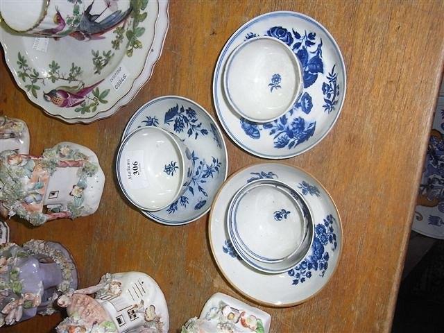 Appraisal: FOUR WORCESTER TEABOWLS in underglazed blue with flower spray and