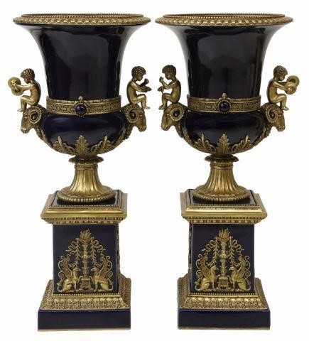 Appraisal: pair Large cobalt porcelain garniture urns with bronze mounts late