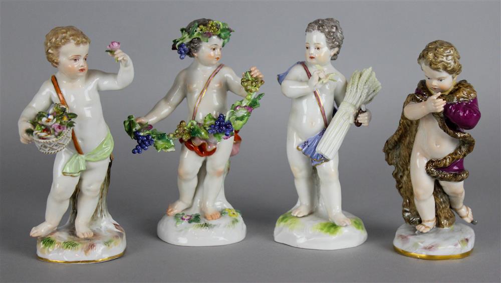 Appraisal: FOUR MEISSEN FIGURES OF SEASONS underglaze blue crossed sword and