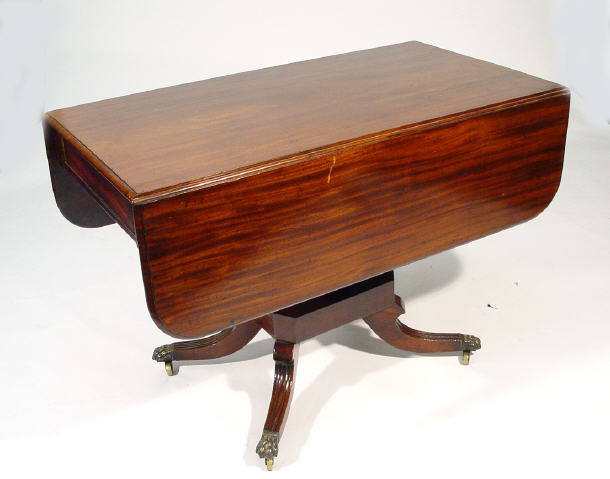 Appraisal: th Century mahogany Pembroke table with end drawer on faceted