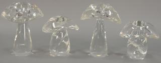 Appraisal: Four large Steuben colorless art glass mushrooms with stylish crystal