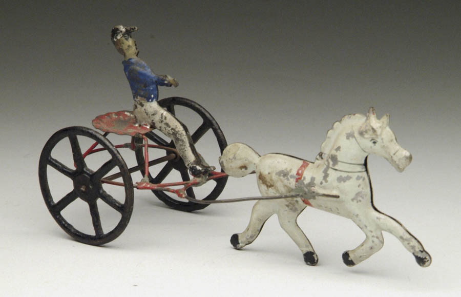 Appraisal: A GEORGE BROWN EARLY AMERICAN TIN SULKY A white horse