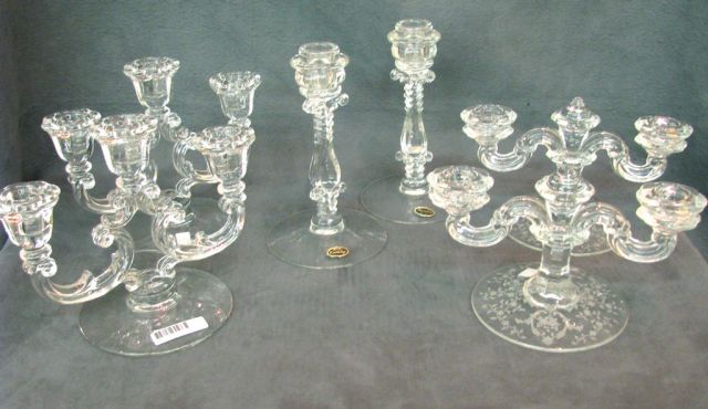 Appraisal: Three pair of candlesticks including pair of Cambridge candlesticks with