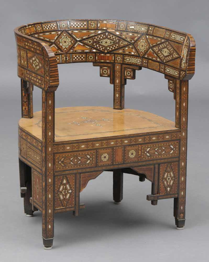 Appraisal: SYRIAN BONE AND MOTHER-OF-PEARL INLAID TUB-BACK ARMCHAIR The curved arm