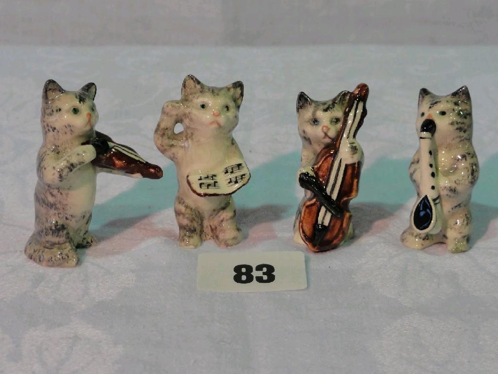 Appraisal: A set of four miniature Beswick cat musicians with grey