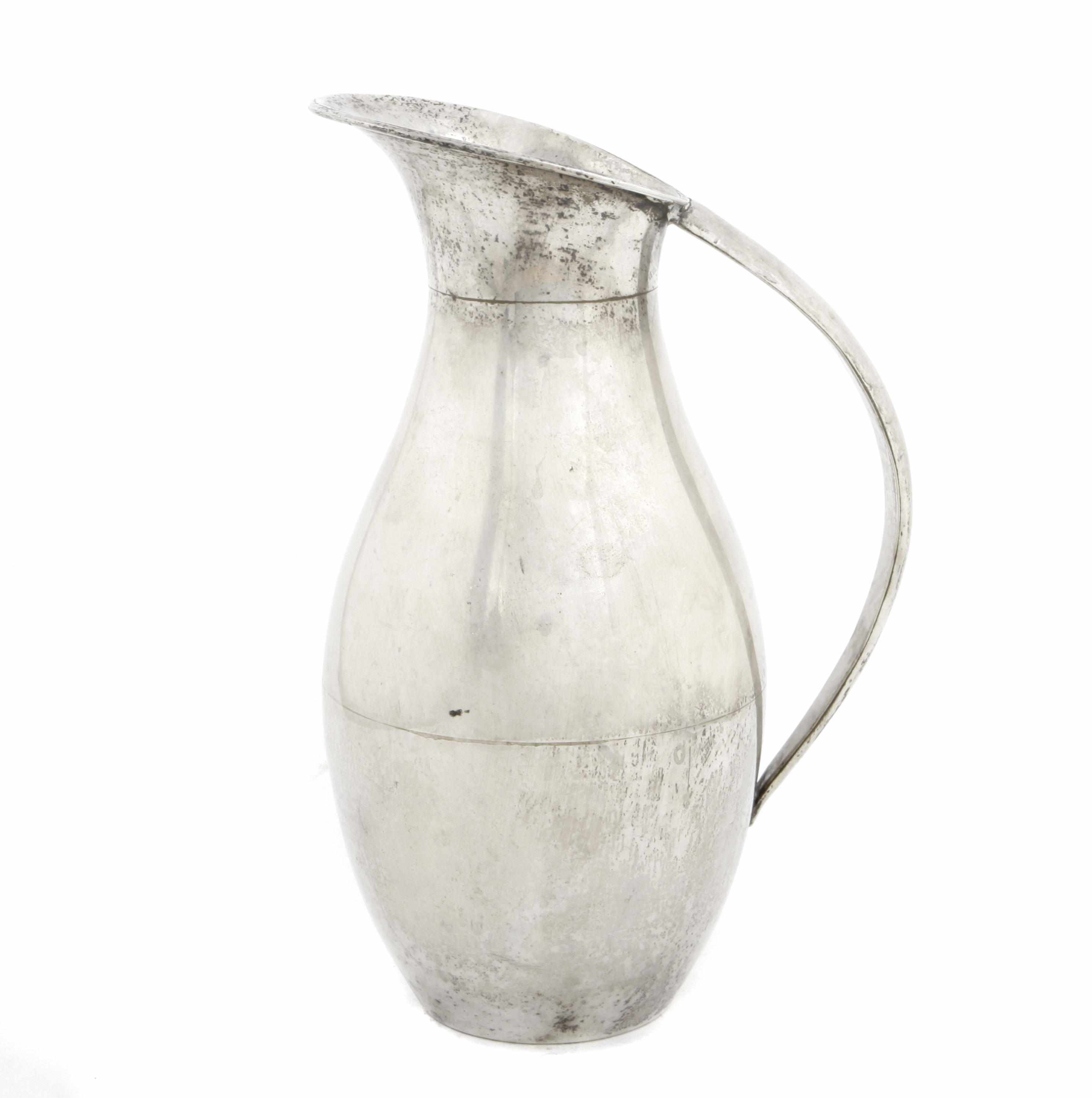 Appraisal: A sterling silver pitcher in the manner of Johan Rohde