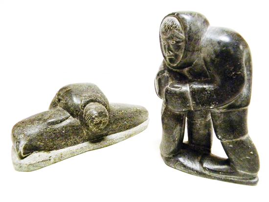 Appraisal: Two ''Eskimo Art Canada'' carved stone figures reclining figure with