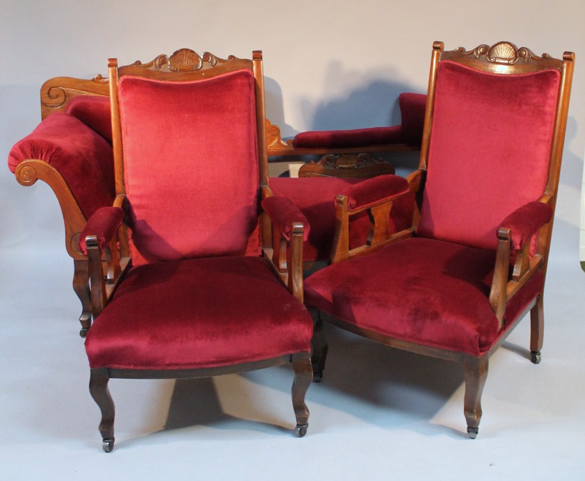 Appraisal: A late Victorian early Edwardian walnut framed three piece lounge