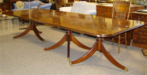 Appraisal: REGENCY STYLE MAHOGANY THREE PEDESTAL TABLE th century the banded