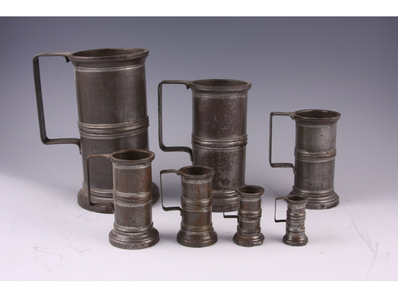 Appraisal: Set of Seven Measurers French th c tin with applied