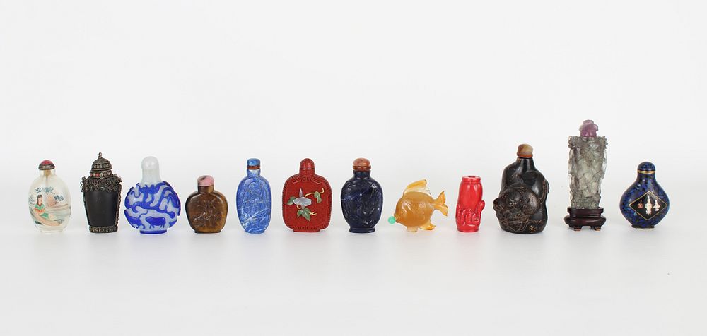 Appraisal: Chinese Snuff Bottles Chinese Snuff Bottles Including a coral snuff