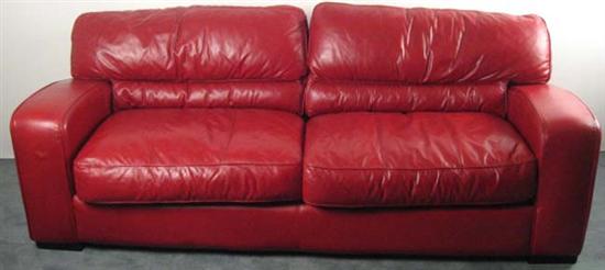 Appraisal: Red Leather Sofa with black wood feet Removeable Velcro seat