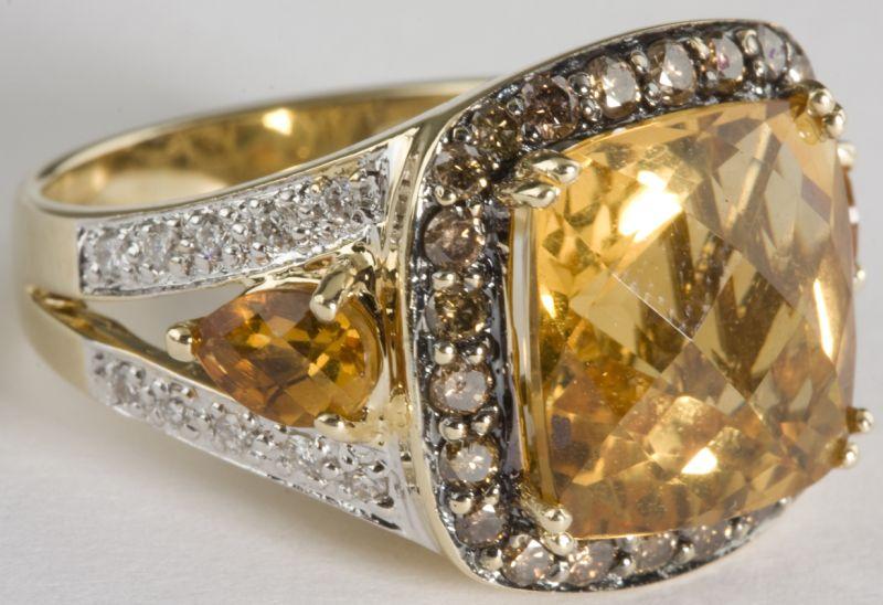 Appraisal: KT Citrine Chocolate and White Diamond Ring centering upon a