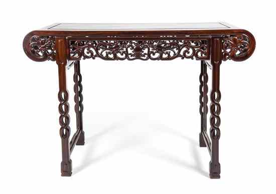 Appraisal: A Chinese Fruitwood Altar Table having a rectangular top above