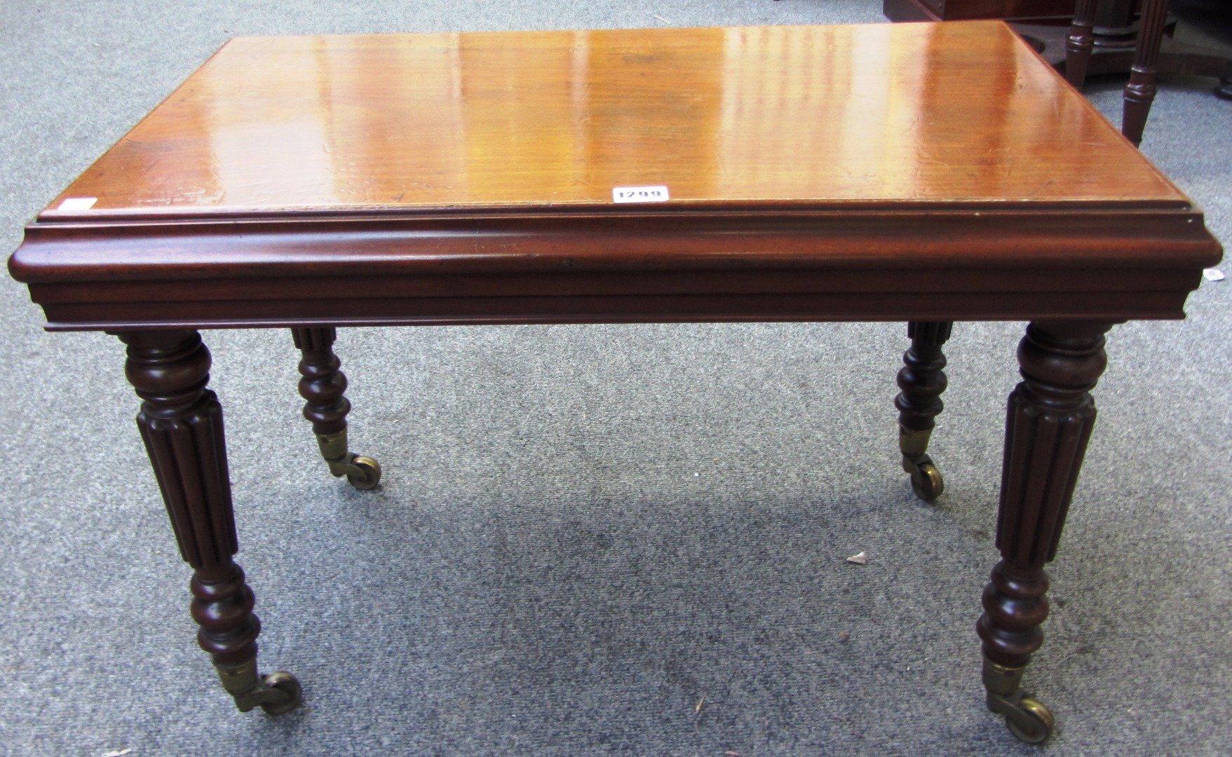 Appraisal: A th century converted mahogany rectangular coffee table on tapering