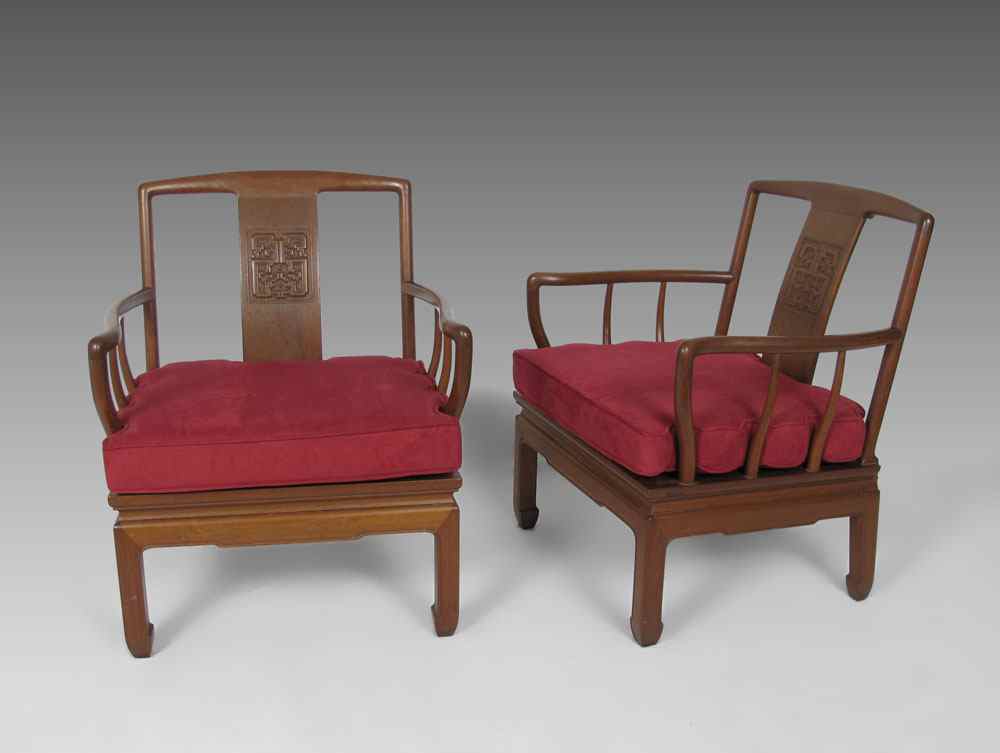 Appraisal: PAIR ORIENTAL ARM CHAIRS Carved oriental design on back splat