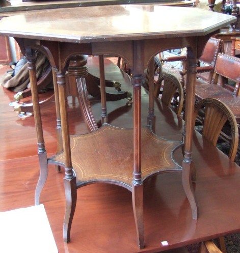 Appraisal: A late th century marquetry inlaid octagonal occasional table raised