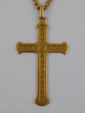 Appraisal: A yellow metal tests carat gold cross with unascribed mark