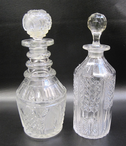 Appraisal: TWO CLEAR CUT GLASS LIQUOR DECANTERS Heights and Condition Report