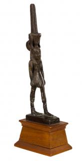 Appraisal: AN ANCIENT EGYPTIAN BRONZE FIGURE OF NEFERTEM TH DYNASTY -