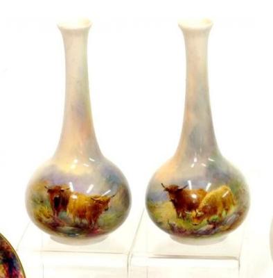 Appraisal: A PAIR OF ROYAL WORCESTER PORCELAIN VASES of bottle form