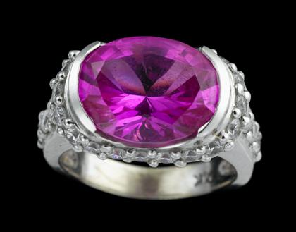 Appraisal: karat white gold pink synthetic sapphire and diamond cocktail ringcontemporary