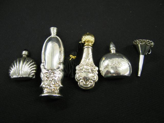 Appraisal: Sterling Silver Perfume Bottles and a perfume funnel includes miniature