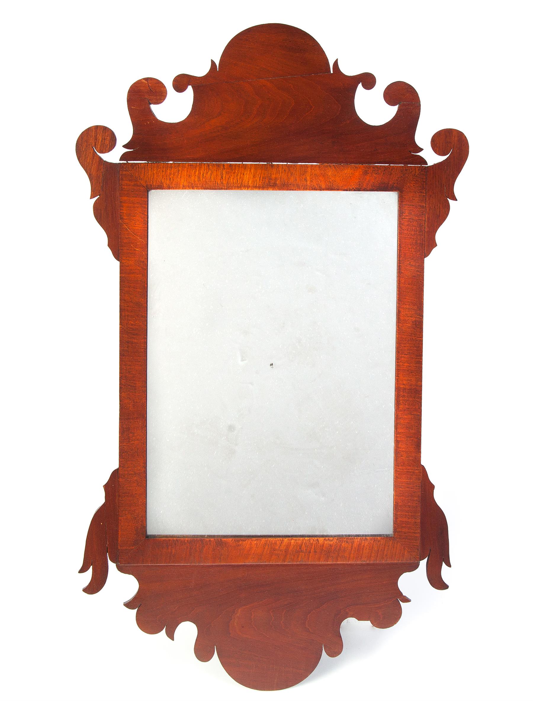 Appraisal: LATE CHIPPENDALE SCROLL MIRROR American ca mahogany and pine Nicely