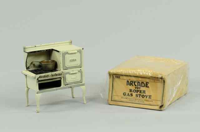 Appraisal: GAS STOVE Arcade cast iron painted cream color 'Roper' in